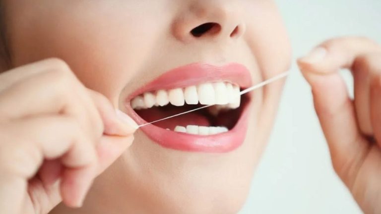 Why Does My Floss Smell Like Poop? Dental Reasons 2026