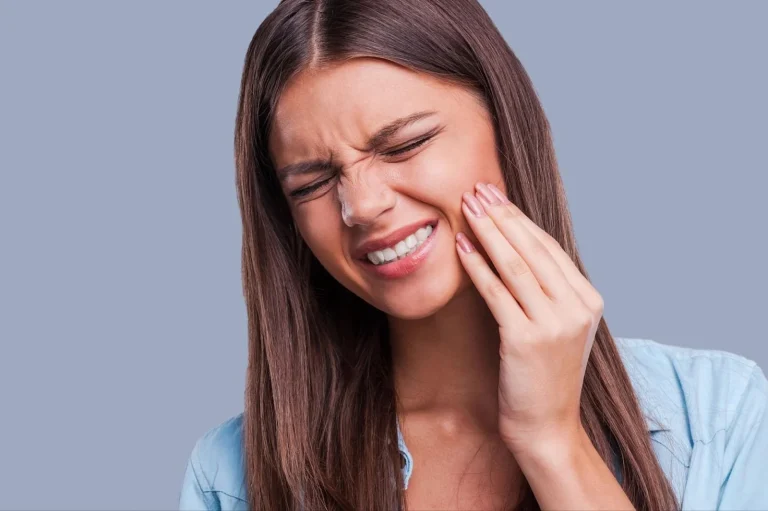 Why Does My Gum Hurt in One Spot in the Back? Causes 2026