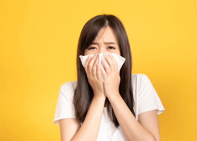 Why Is My Snot Neon Yellow? Here's What It Means 2026